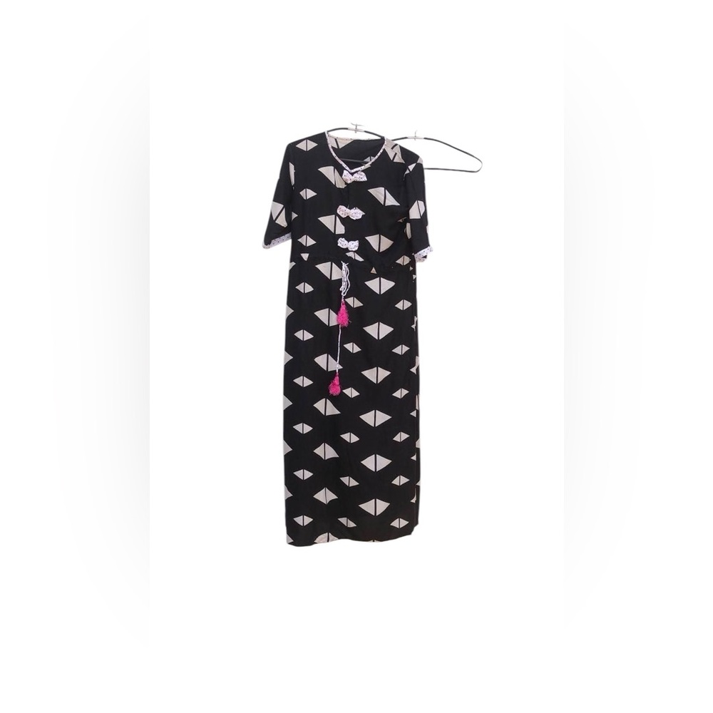 Black Geometric Maxi Dress with Pink Tassel Accent